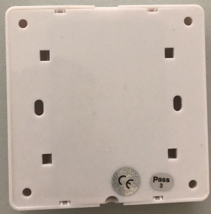 Back of the BellMe B-SW2 showing the mounting holes and battery compartment