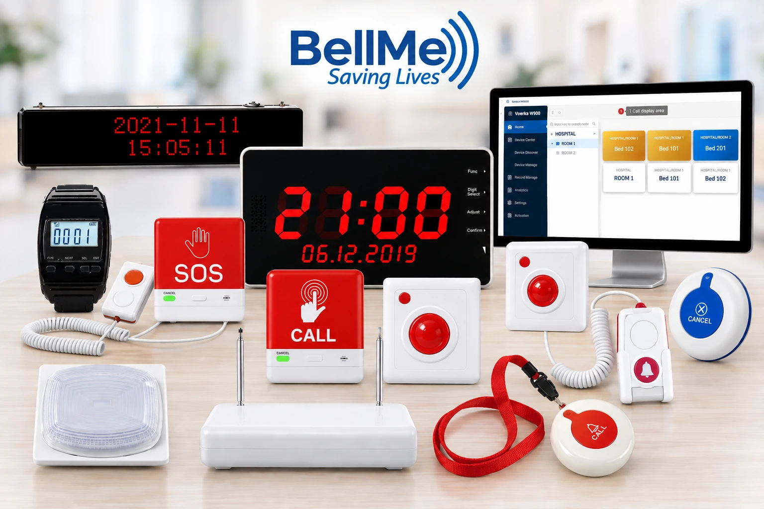 The BellMe product range laid out on a table: LED display panels, a wristwatch receiver, wall and pendant call buttons, a corridor light and the W900 software on a computer screen